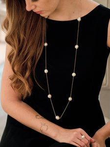 Luxury jewelry. Baroque pearls. Long necklace.
