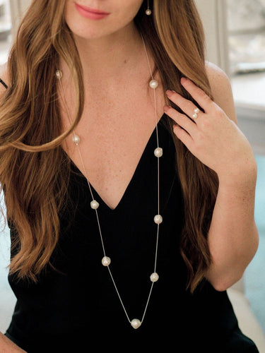 Luxury jewelry. Baroque pearls. Long necklace.